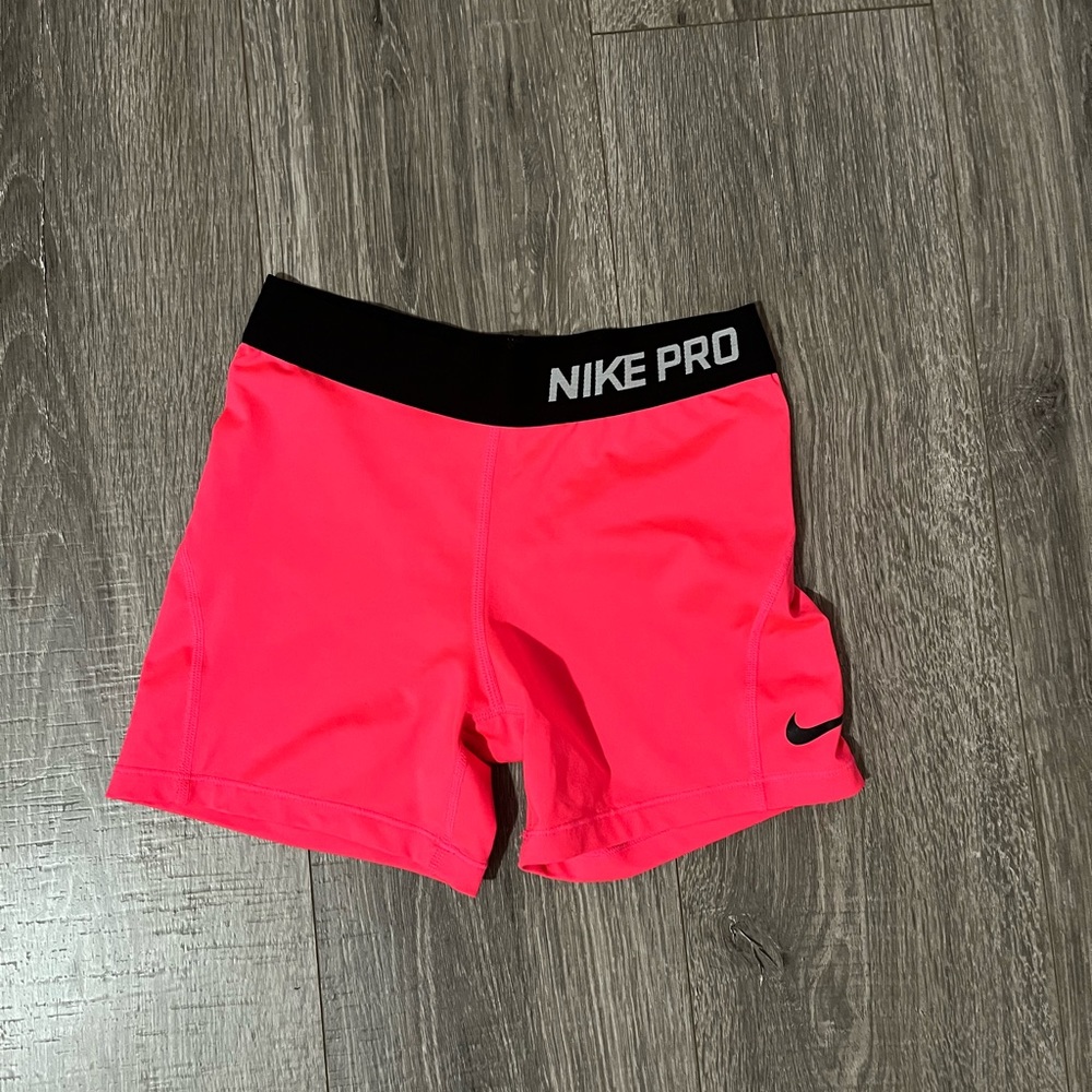 Neon pink nike pros